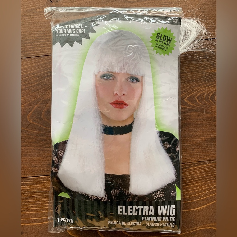New in bag, never worn OS glow in the dark wig